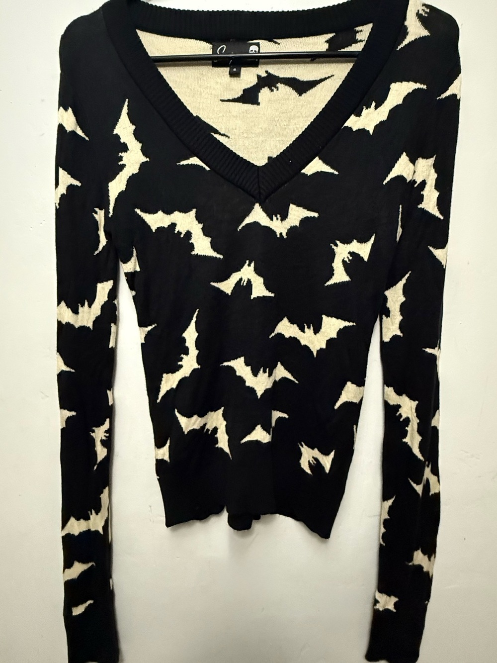 Sourpuss Black and Cream Bat-Print V-Neck Sweater